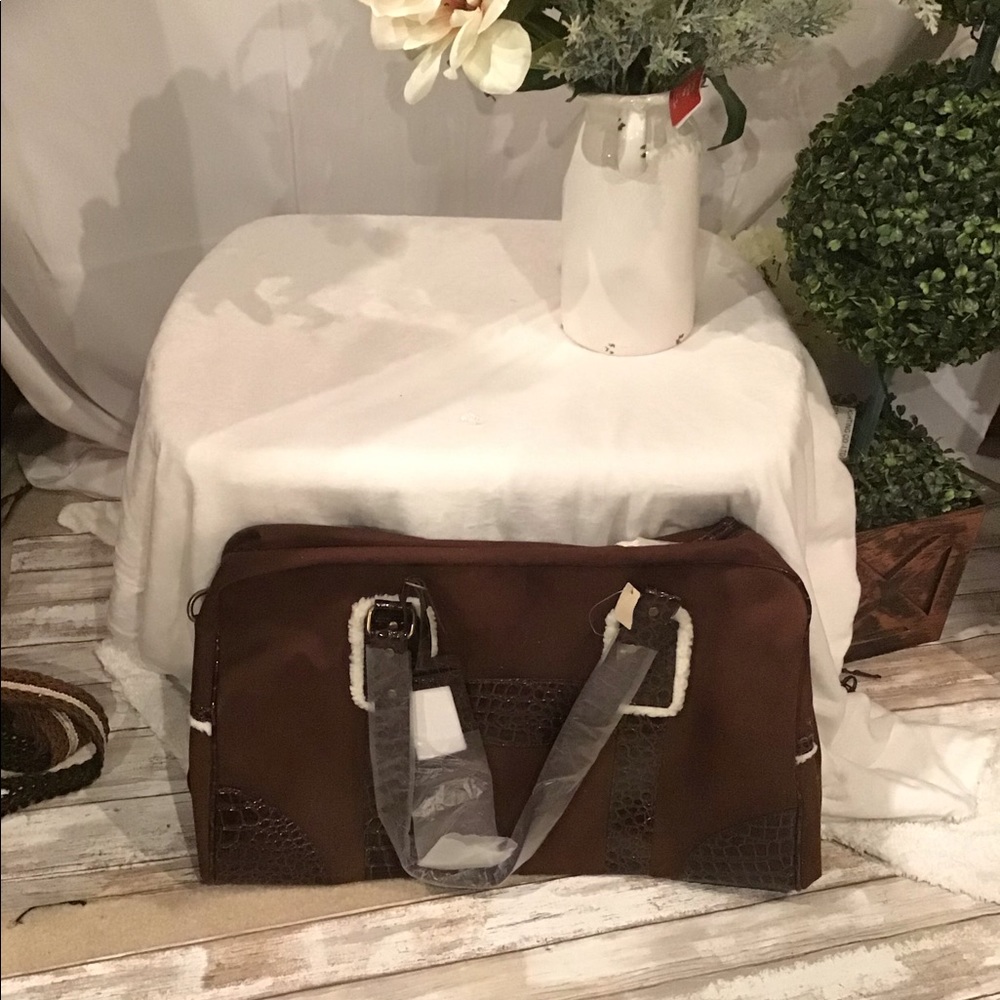 Large brown Swede luggage bag